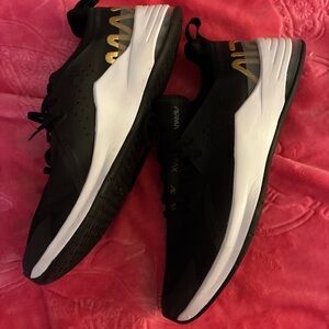 Nike Black and Gold Sneakers Sleek Design